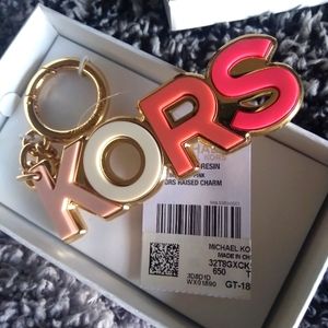 Michael Kors Keychain. New with Box and tags pinks and 🍑 peaches